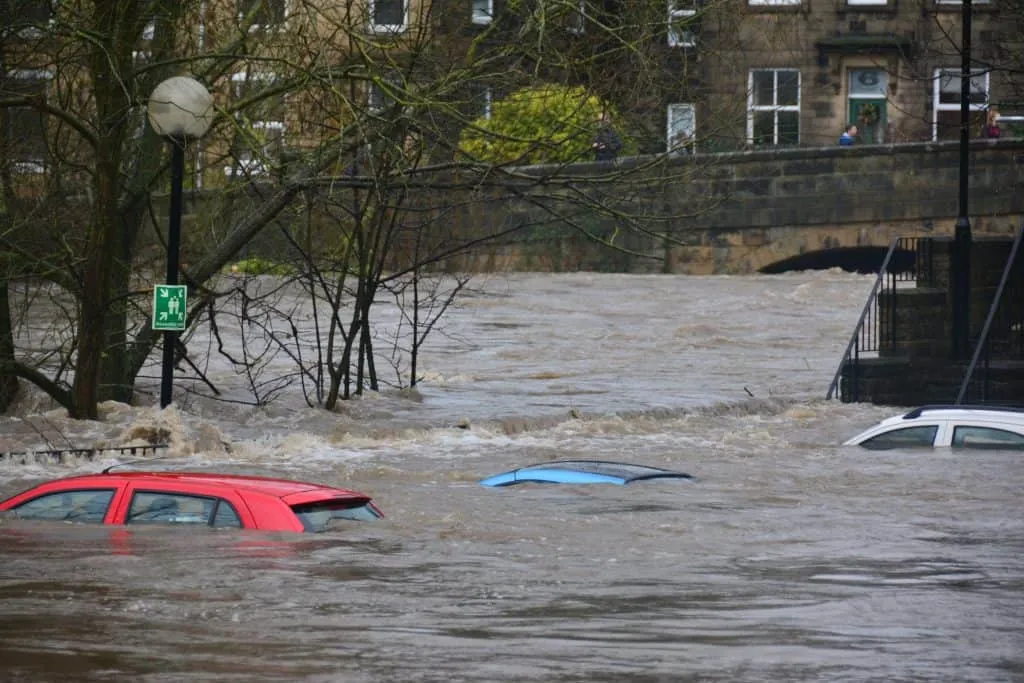 Cars submerged by flood waters